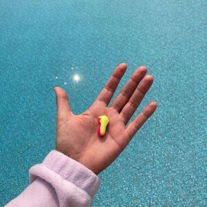 Half the pair, double the character. One earplug, slightly seasoned.